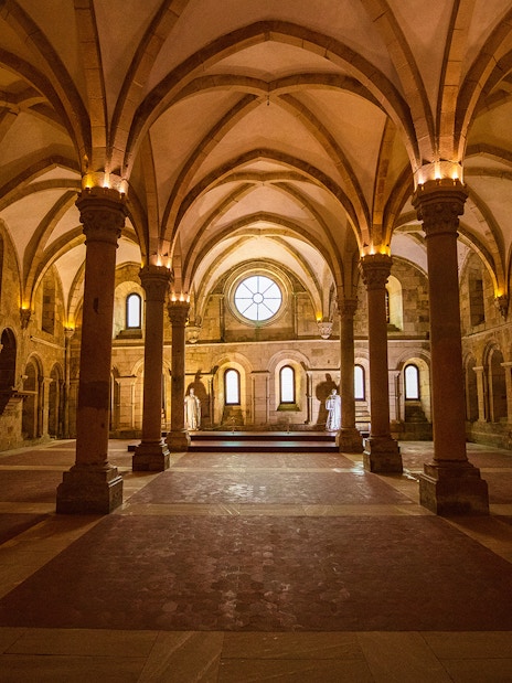 Dinning hall with vaulted ceilings and columns at Alcobaça Monastery, Portugal.