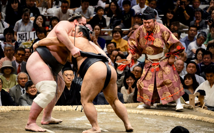 Sumo wrestlers competing in Tokyo Grand Sumo Tournament, Sumida, Tokyo.