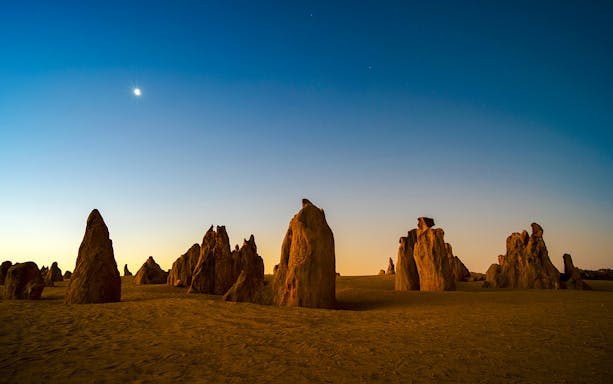 Rock formations at sunset in the Pinnacles Desert, Western Australia.