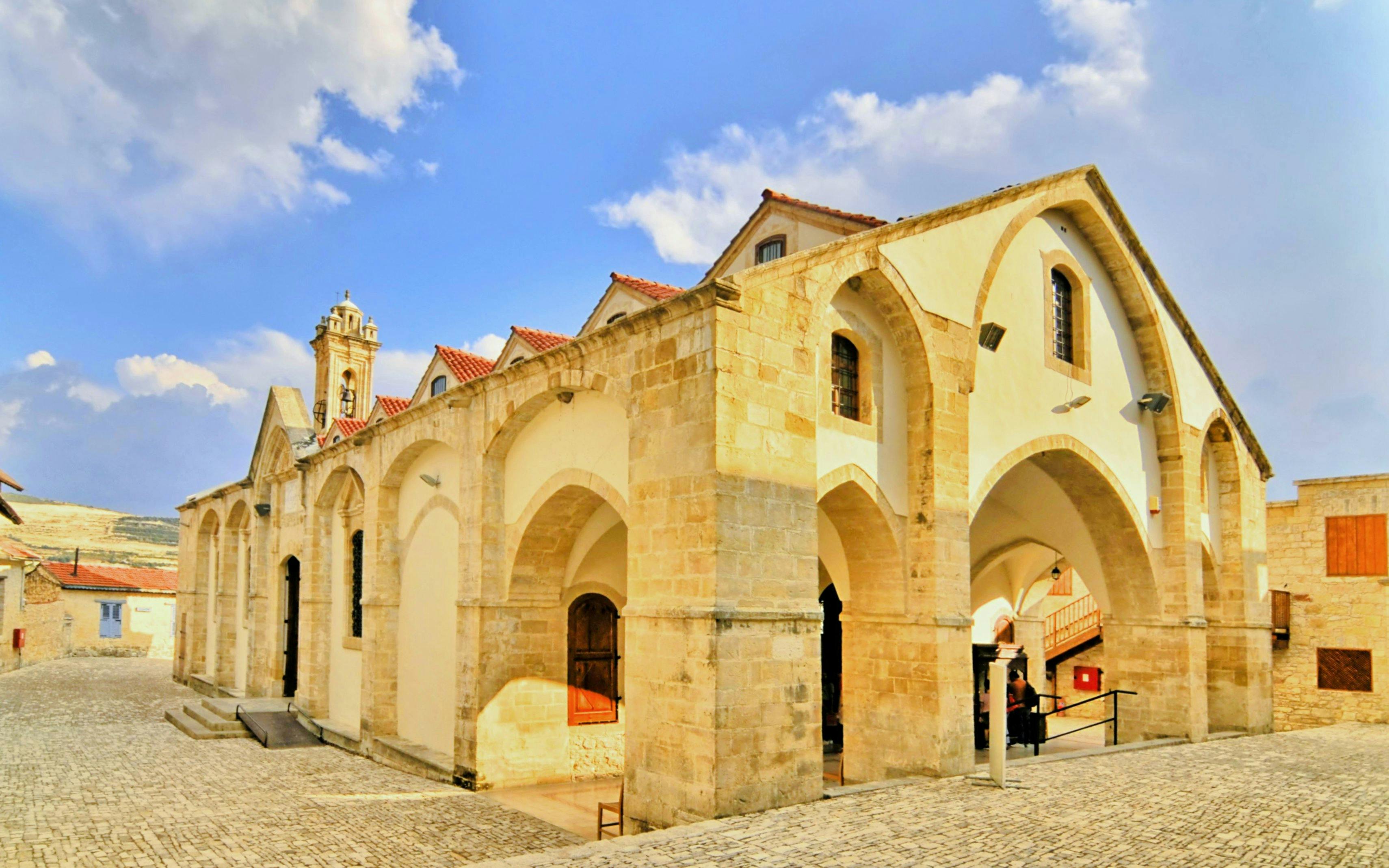 Monastery of the Holy Cross with arched facade in Omodos, Cyprus.