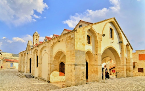 Monastery of the Holy Cross with arched facade in Omodos, Cyprus.