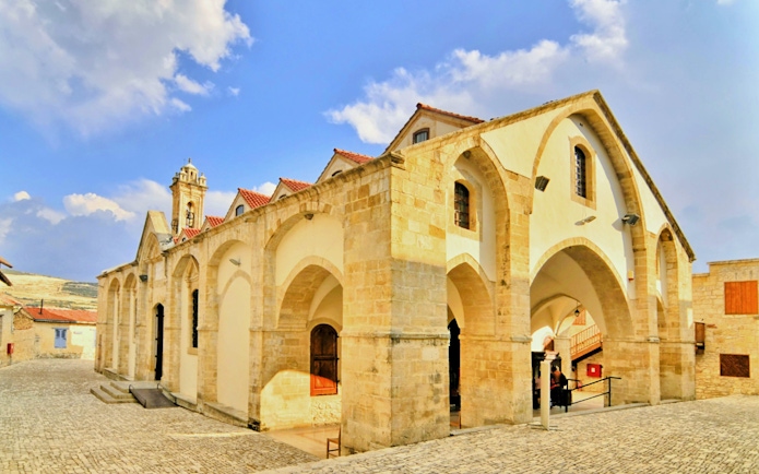 Monastery of the Holy Cross with arched facade in Omodos, Cyprus.