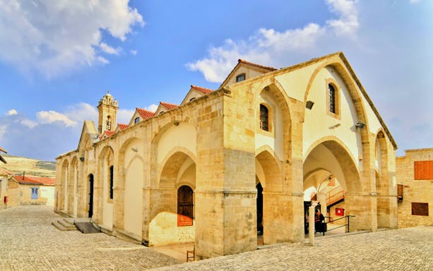 Monastery of the Holy Cross with arched facade in Omodos, Cyprus.