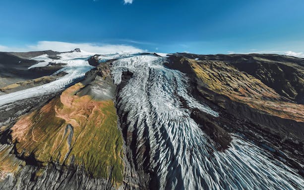 Aerial view of glacier crevasse and ice maze in Skaftafell, Iceland.