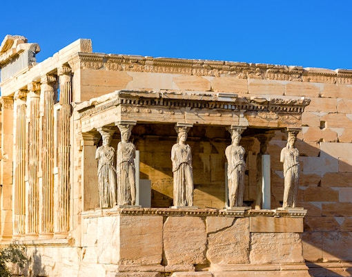 Erechtheion temple on the Acropolis, Athens, showcasing ancient Greek architecture.