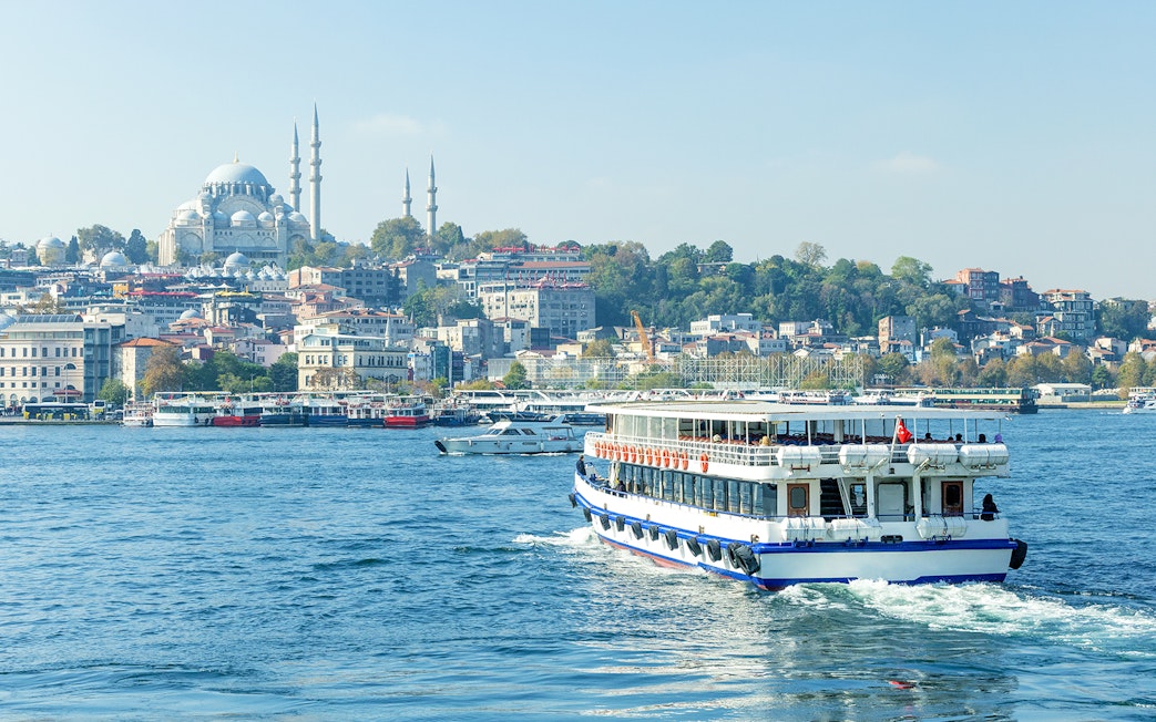 Bosphorus cruise with view of Istanbul's Blue Mosque in the background.