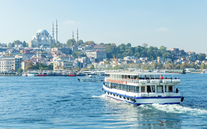 Bosphorus cruise with view of Istanbul's Blue Mosque in the background.