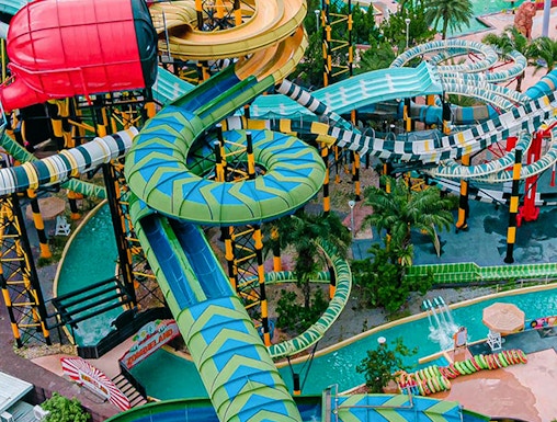 Water slides and attractions at a theme park in Pattaya, Thailand.