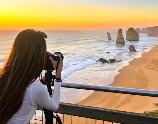 Visitors exploring the Blue Planet Aquarium's vibrant marine life exhibits