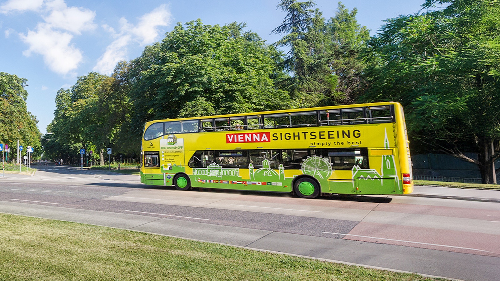 Vienna cityscape with hop-on hop-off tour bus near historic buildings and city