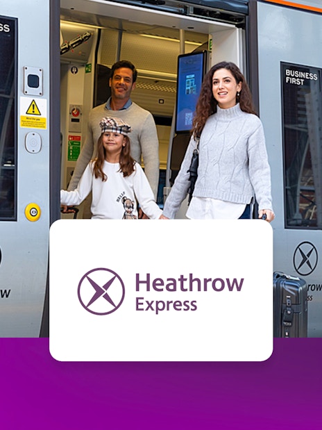 Passengers exiting Heathrow Express train at London Paddington station.