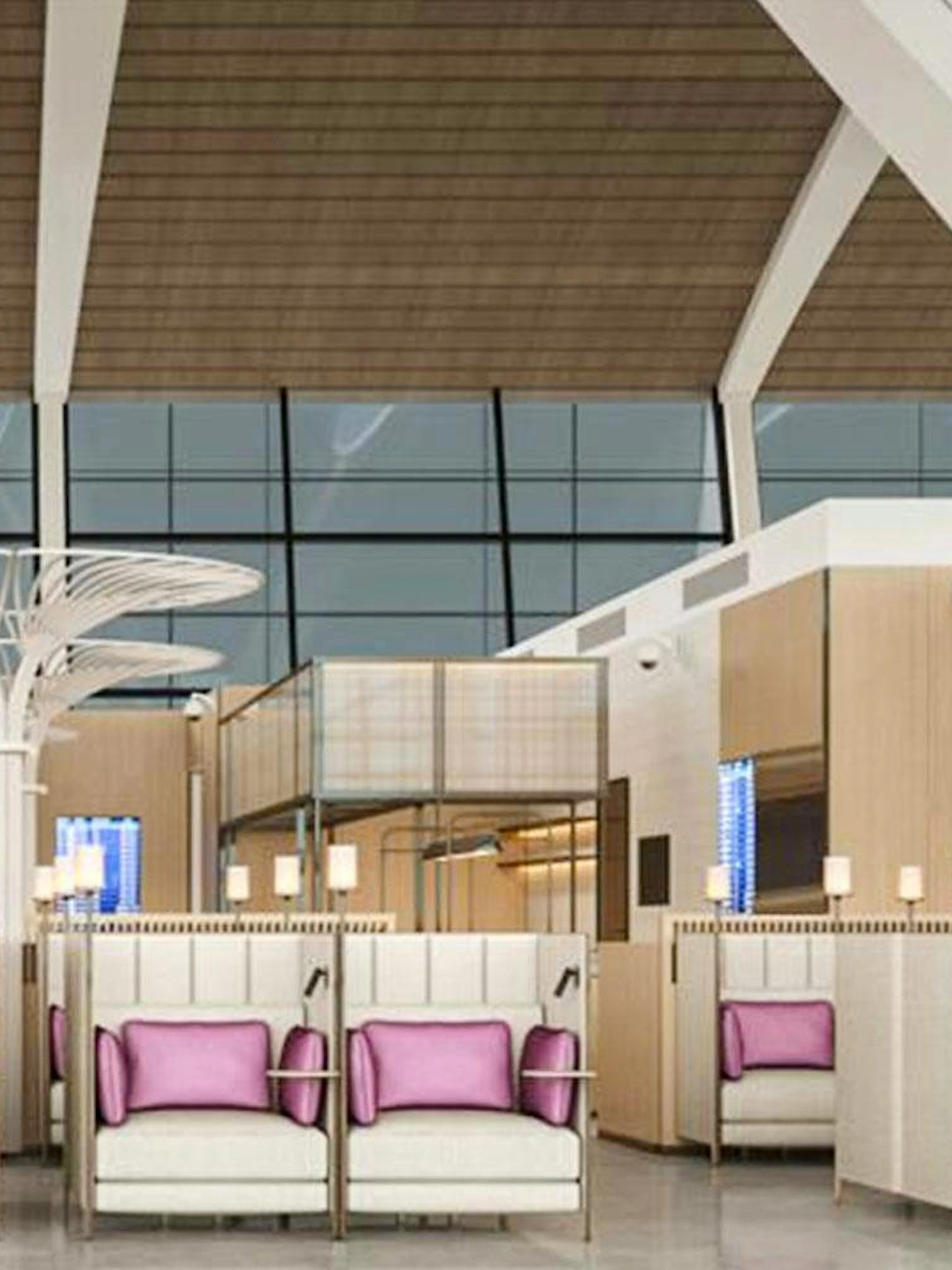 Seating area in Shanghai Pudong International Airport lounge with modern design.