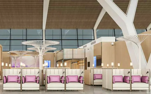 Seating area in Shanghai Pudong International Airport lounge with modern design.