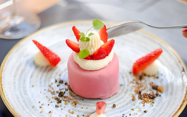 Dessert with strawberries and cream served on Bustronome Paris tour.