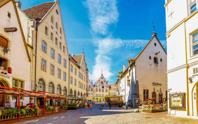 Tallinn old town square with medieval buildings and outdoor cafes, Estonia.
