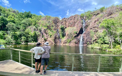 Visitors viewing waterfalls at Litchfield National Park, Australia.