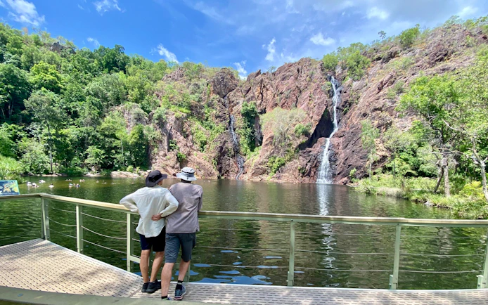 Visitors viewing waterfalls at Litchfield National Park, Australia.