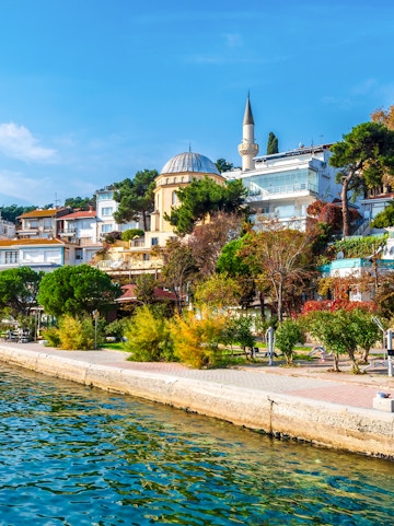Burgazada Island street view with mosque and waterfront in Istanbul.