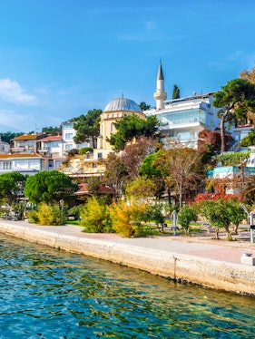 Burgazada Island street view with mosque and waterfront in Istanbul.