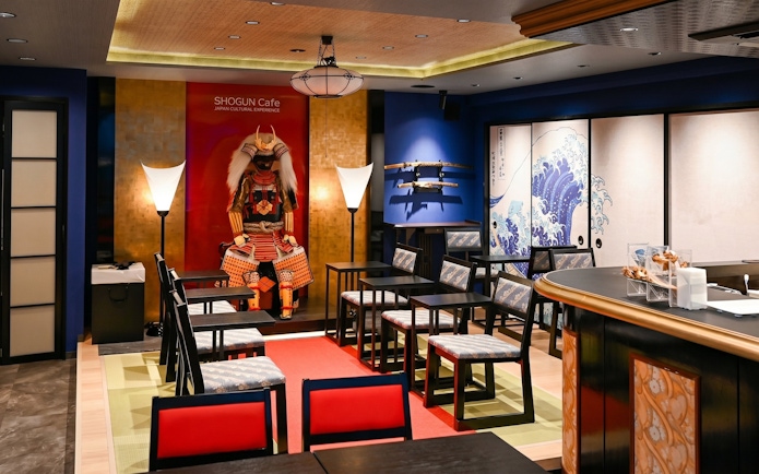 Samurai-themed cafe interior in Tokyo with traditional decor and seating.