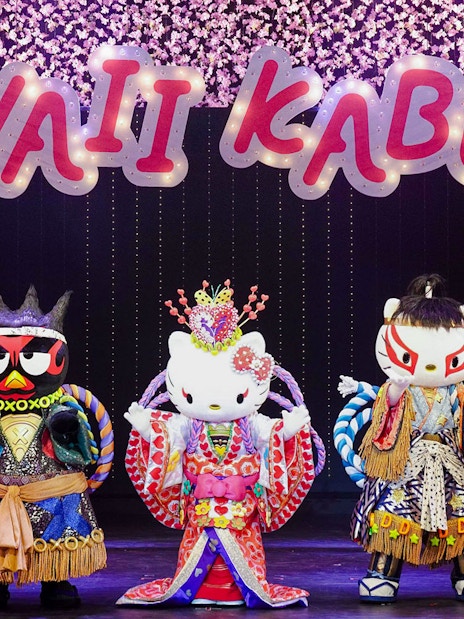 Sanrio characters in kabuki costumes on stage at Sanrio Puroland, Tokyo.