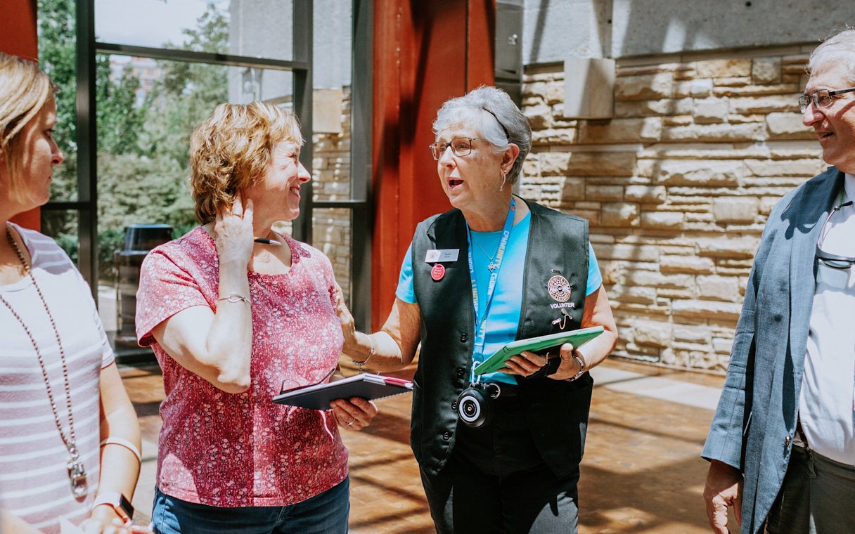 Guide leading a group through the Country Music Hall of Fame in Nashville, Tennessee.