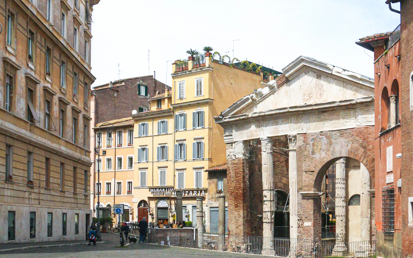 Portico of Octavia in Rome's Jewish Ghetto with surrounding historic buildings.