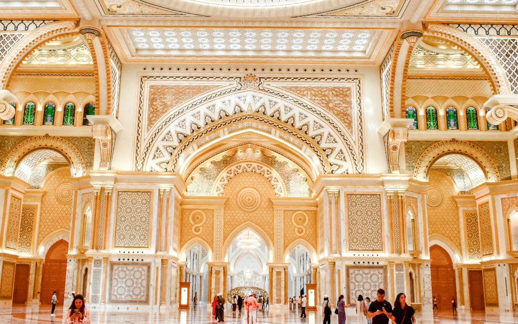 Interior of Qasr Al Watan in Abu Dhabi showcasing ornate arches and intricate designs.