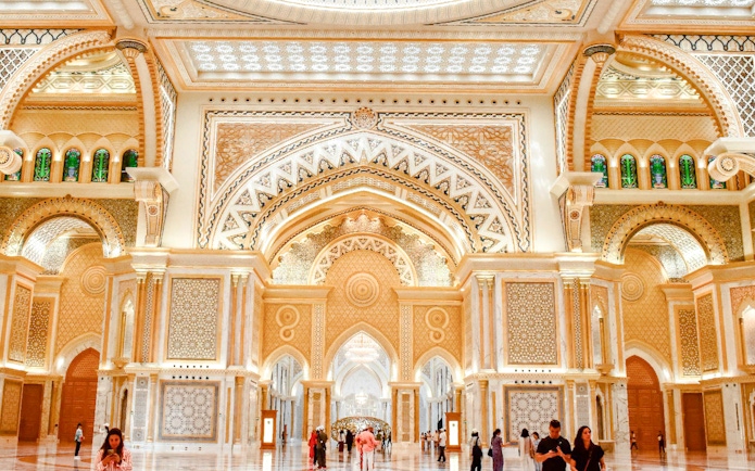 Interior of Qasr Al Watan in Abu Dhabi showcasing ornate arches and intricate designs.