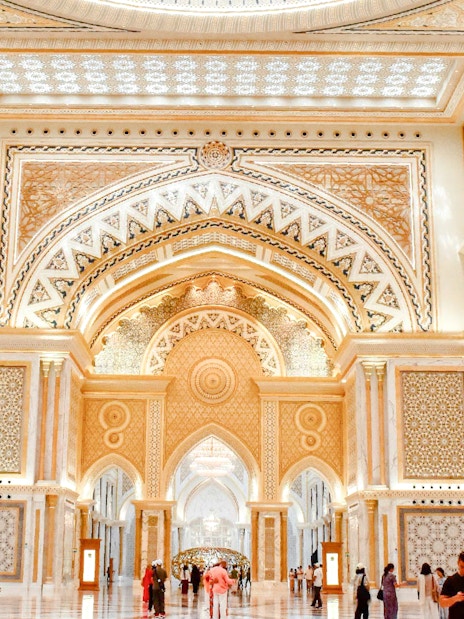 Interior of Qasr Al Watan in Abu Dhabi showcasing ornate arches and intricate designs.