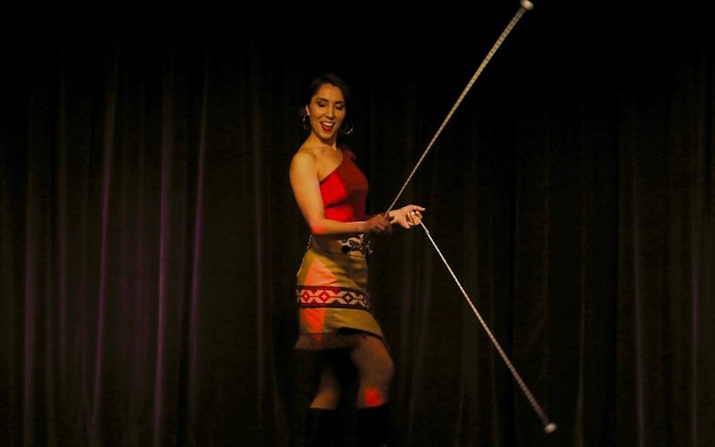 Dancer with baton at Michelangelo Tango Show in Buenos Aires.