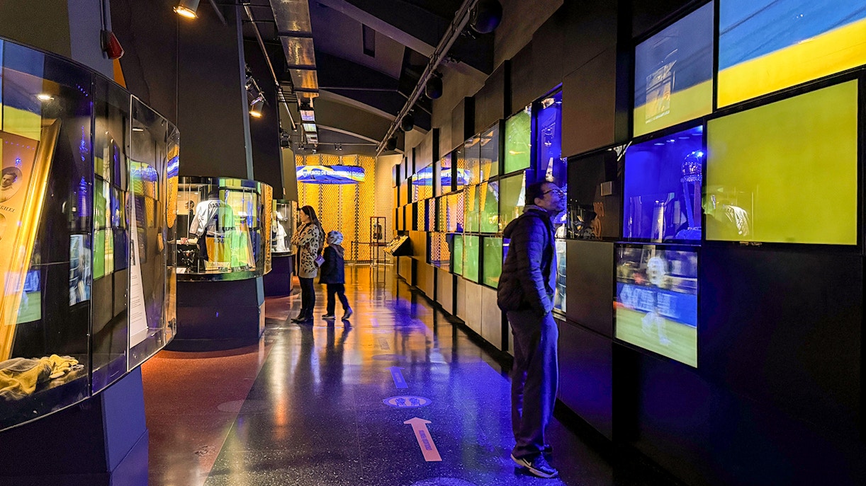 La Bombonera stadium museum interior with River Plate memorabilia display.