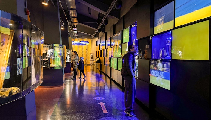 La Bombonera stadium museum interior with River Plate memorabilia display.