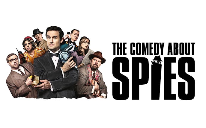 Characters in spy attire with "The Comedy About Spies" text.