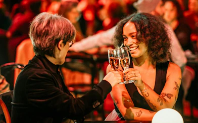 Guests toasting at NGV Friday Nights, Cartier Exhibition, National Gallery Victoria.