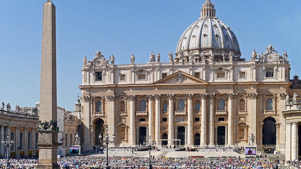St. Peter's Basilica with crowd in Vatican City during Papal Audience.