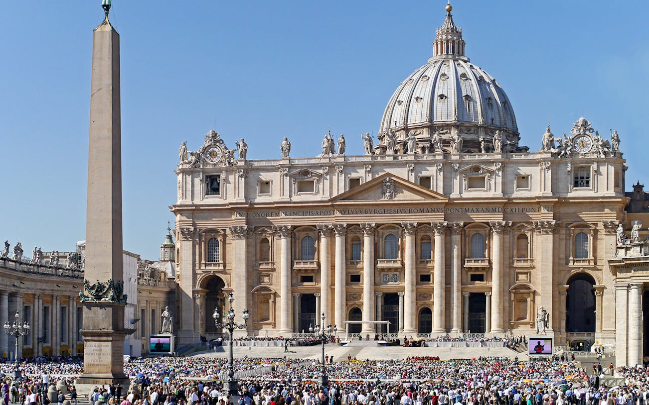 St. Peter's Basilica with crowd in Vatican City during Papal Audience.