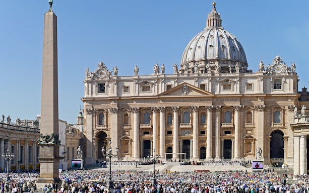 St. Peter's Basilica with crowd in Vatican City during Papal Audience.