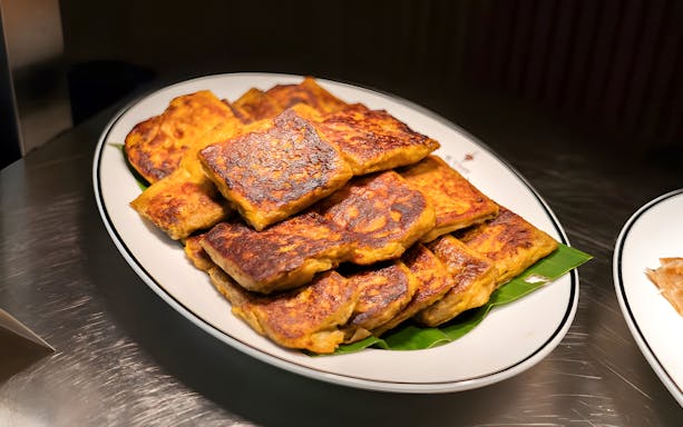 Traditional Malaysian murtabak served at KL Tower Ramadan buffet.