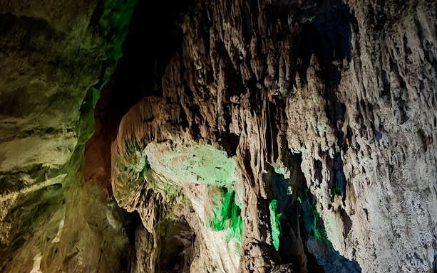 Rock formations inside San Giovanni Caves on the Vagoni Path trek.