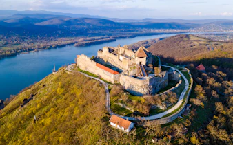 Aerial view of Visegrad Castle overlooking the Danube River in Hungary.