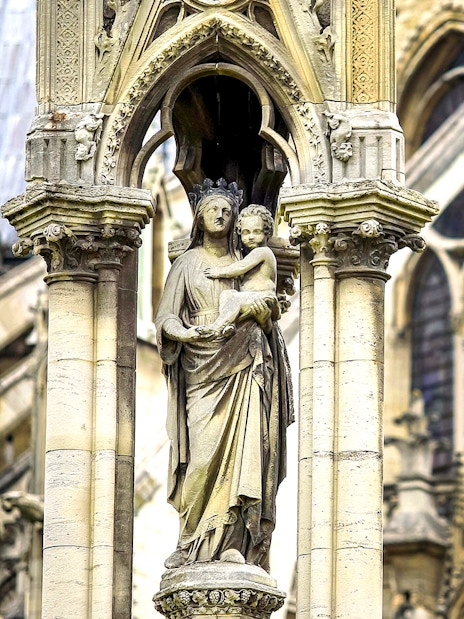 Notre-Dame Cathedral statue detail, Paris tour with audio guide.