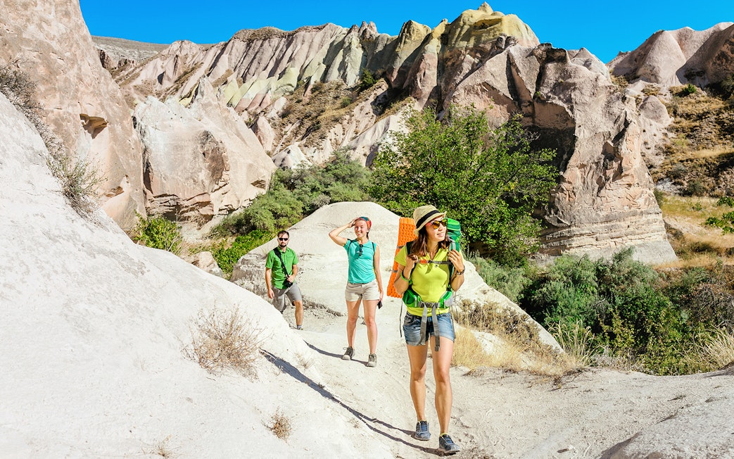 Guests hiking through Love Valley's unique rock formations in Cappadocia.