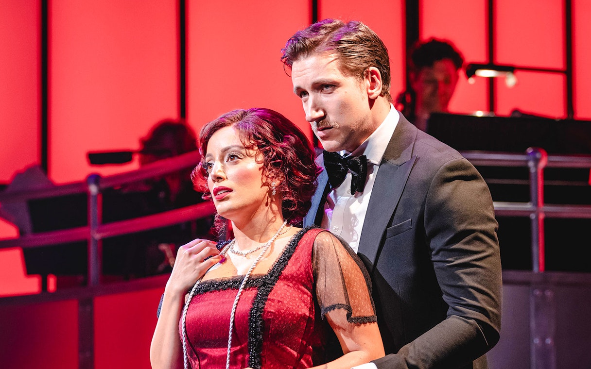 Actors performing on stage in Titanique West End show.