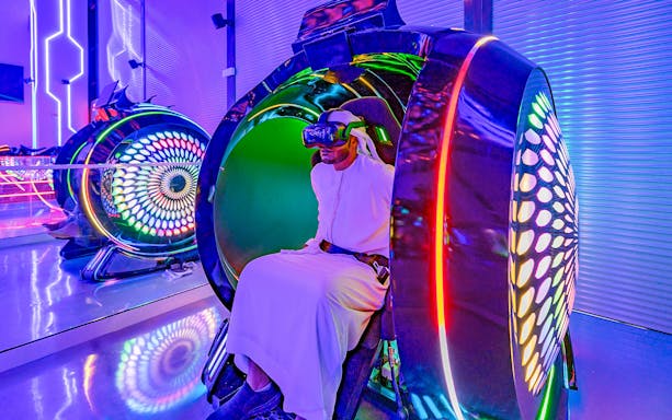 Person experiencing virtual reality at Pixoul Gaming, Abu Dhabi.