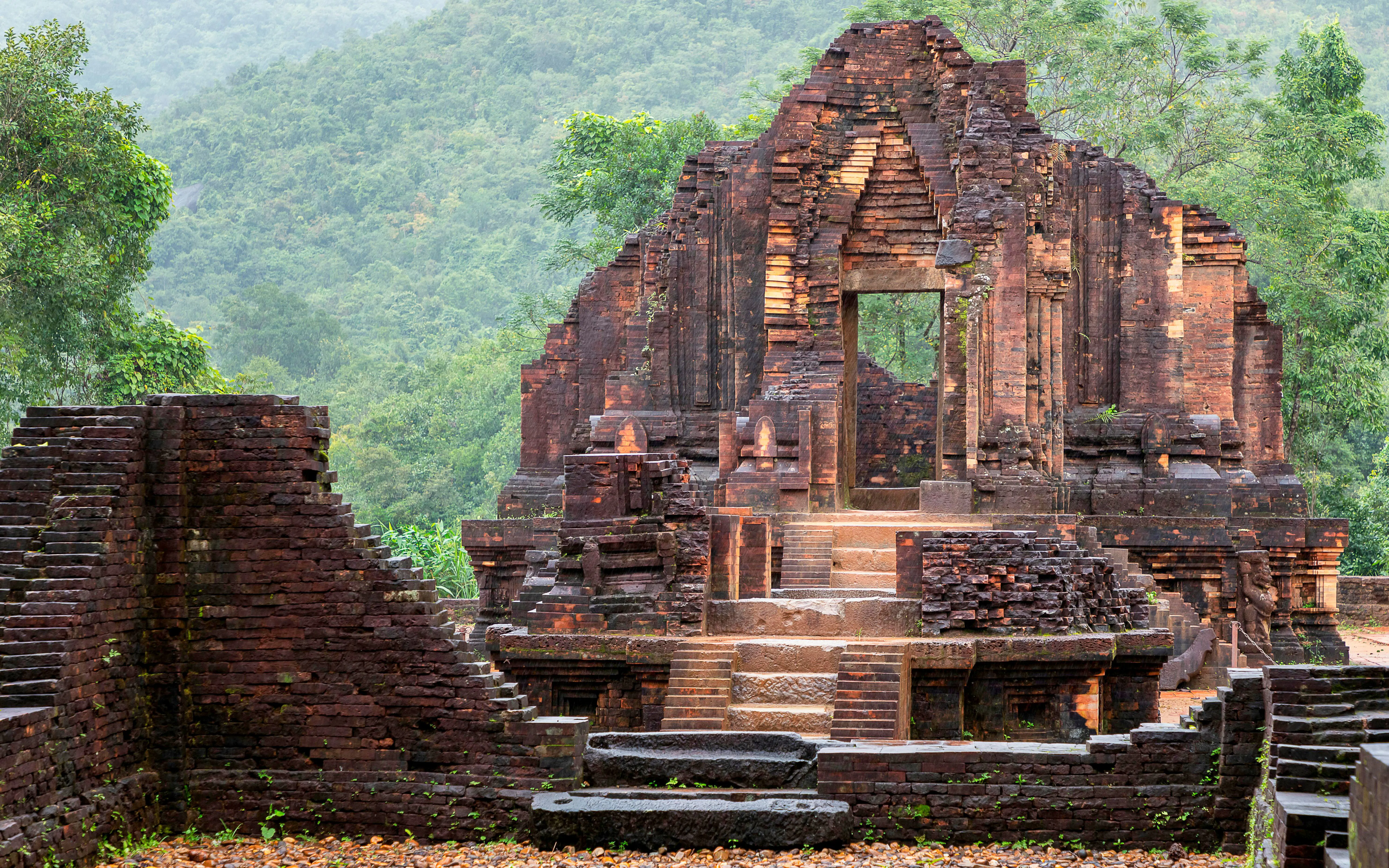 Ancient temple ruins with intricate carvings at My Son Sanctuary, Vietnam.