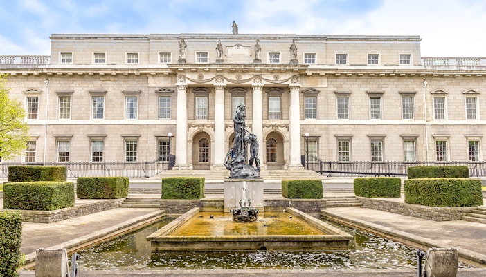 National Gallery of Ireland exterior with Dublin Big Bus tour in foreground.