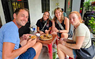 Hoi An Small-Group Food Walking Tour with Paper Lantern Release and Hoai River Boat Ride