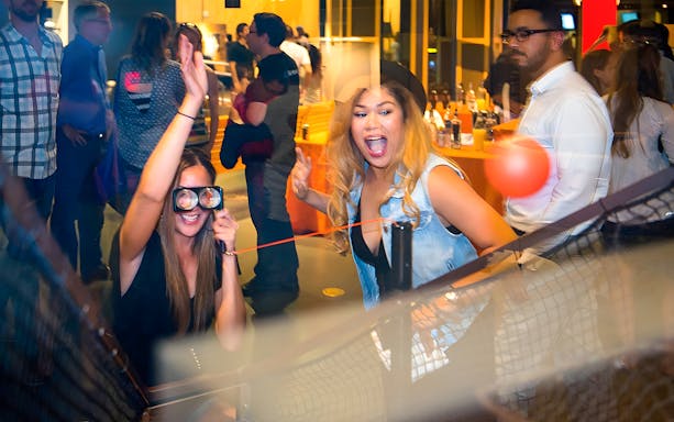 Visitors enjoying interactive exhibits at the Exploratorium in San Francisco.