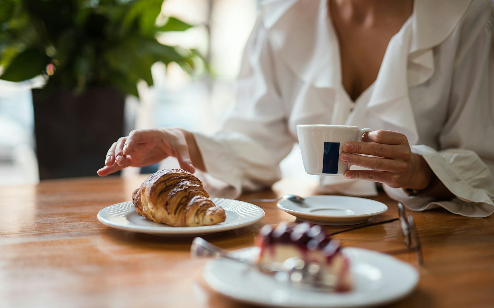 Croissant and coffee on a table